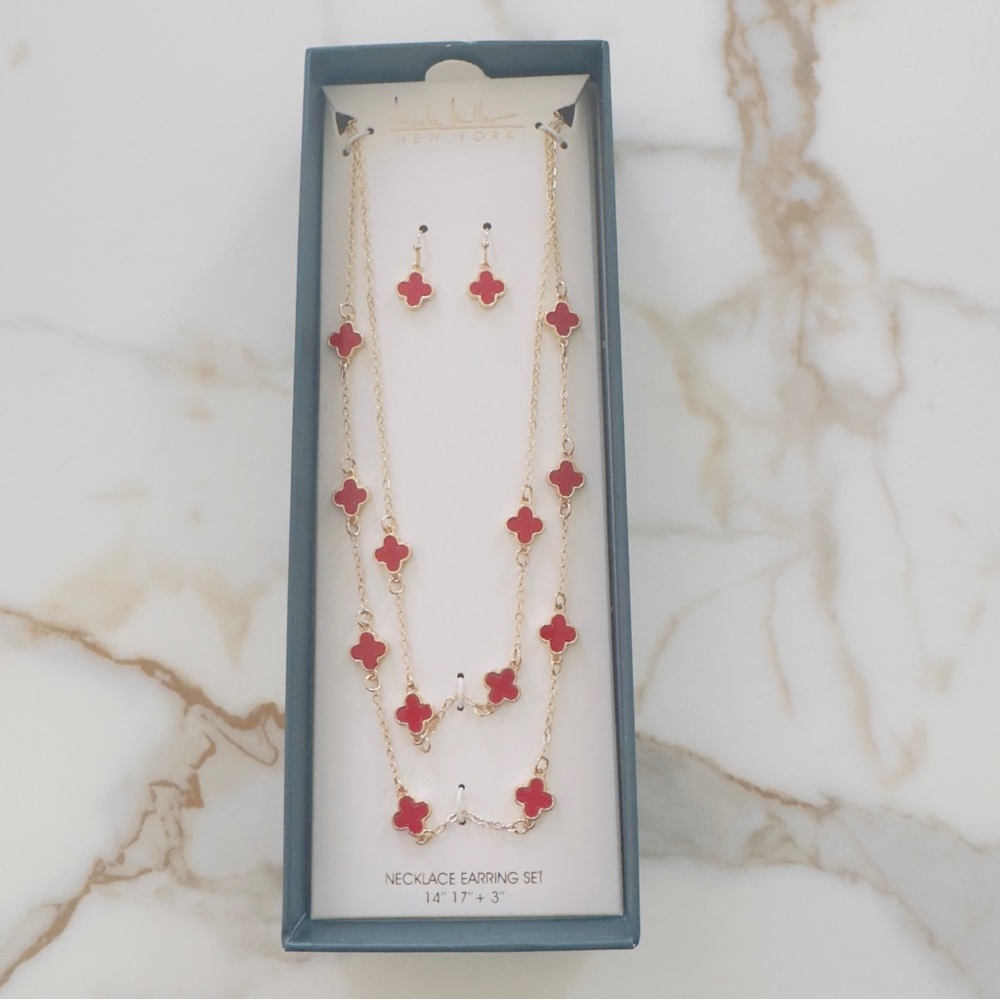 Nicole Miller New York Gold tone Necklace with Red Clover Charms earrings set.